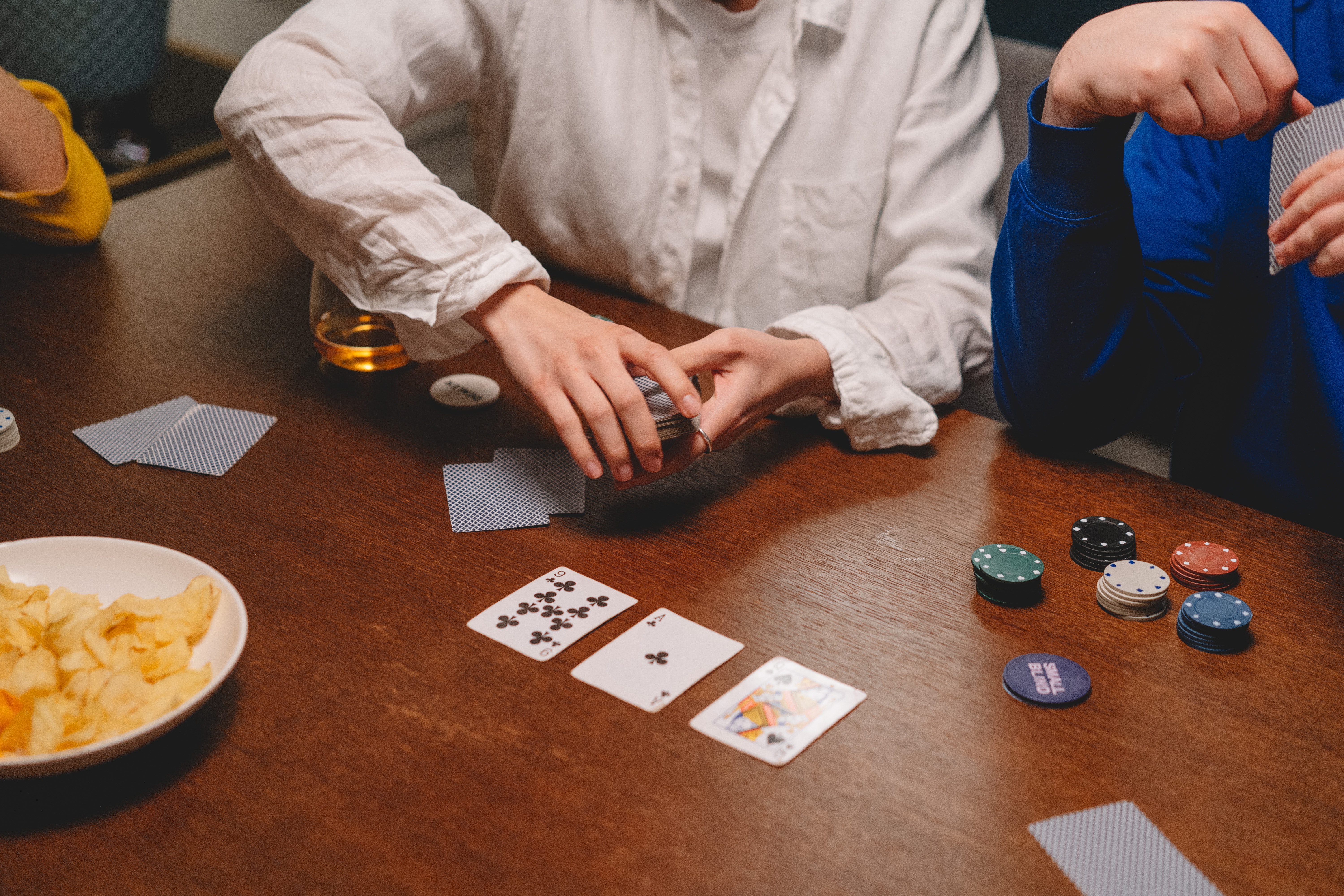 Friends playing a home poker game